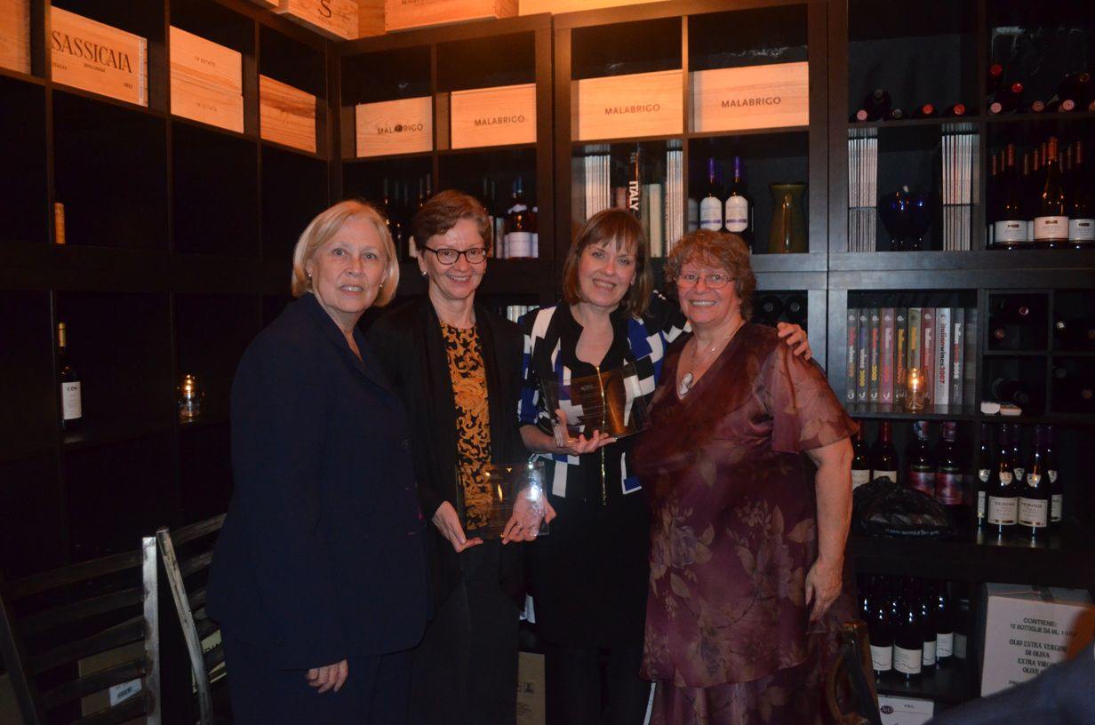 Four women together at a Foundation awards event
