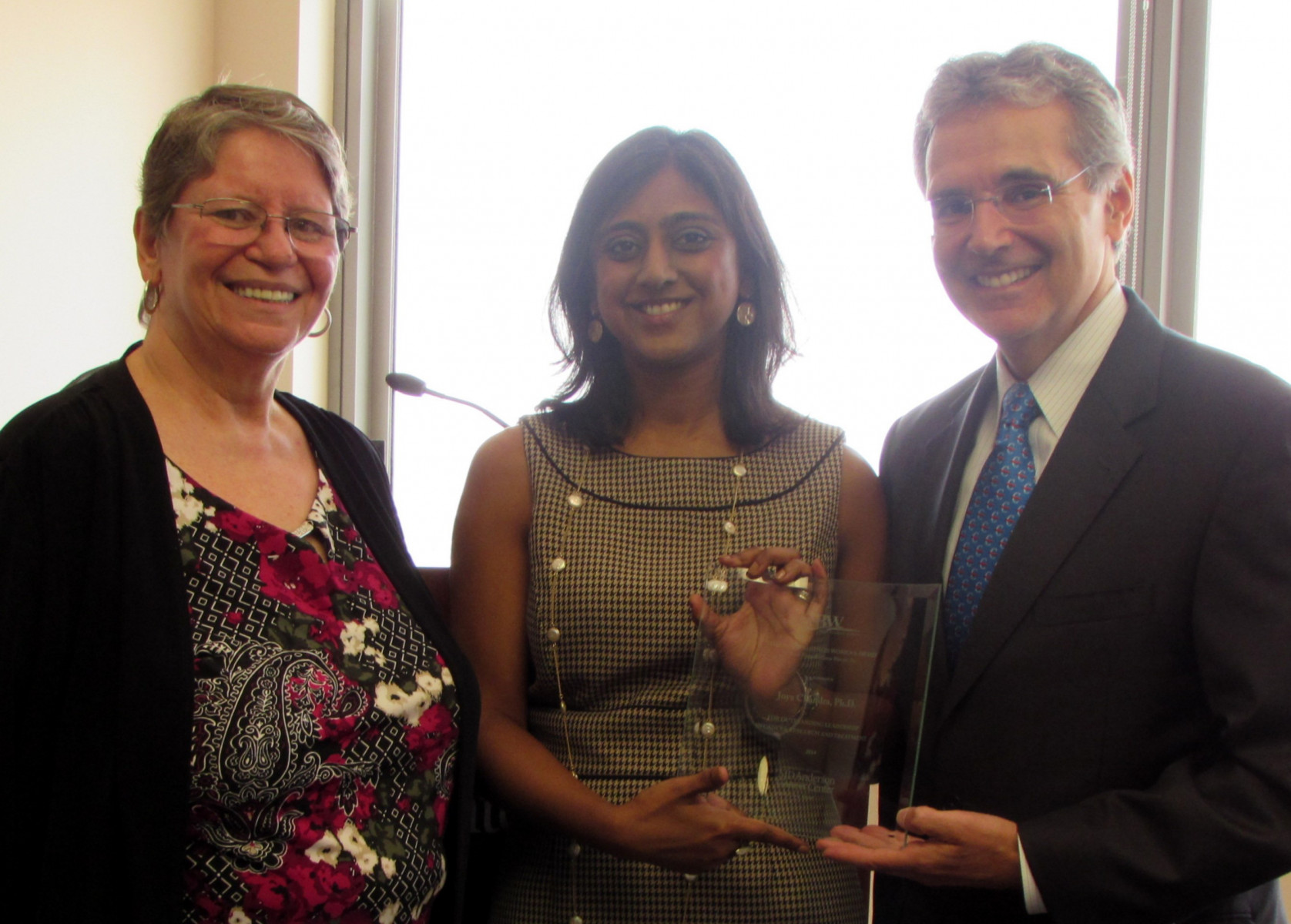 Award presentation at the September 2014 M.D. Anderson scholarship luncheon